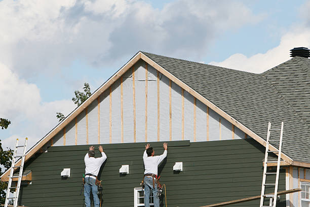 Professional Siding Contractor technician working in Bethel, NC
